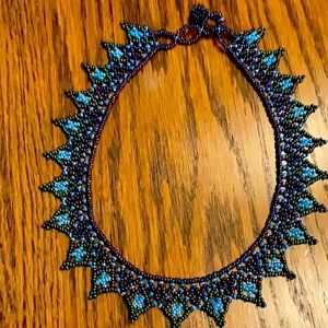 Multi colored 14 inch beaded choker necklace. Brand new and never worn!!